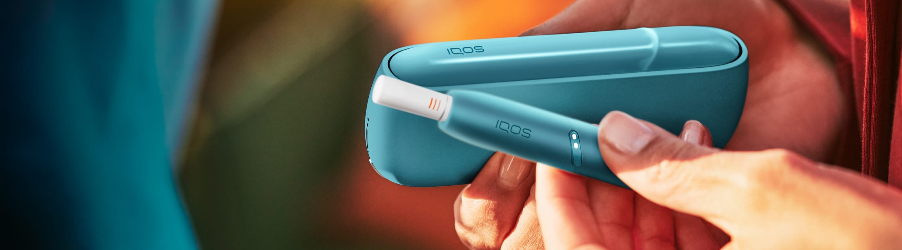 A gold IQOS device.