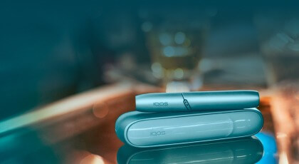 Light blue IQOS Originals Duo Holder and Pocket Charger, available in other vibrant colors.