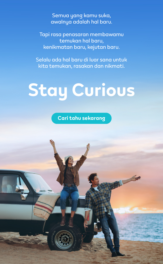 Banner Stay Curious IQOS – Seorang pria dan seorang Wanita berdiri di pnatai dengan sebuah mobil