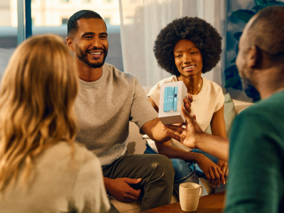 A GROUP OF PERSON WITH IQOS ILUMA I