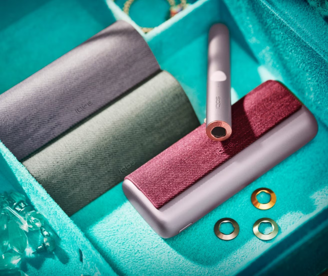 A jewellery box containing IQOS ILUMA rings.