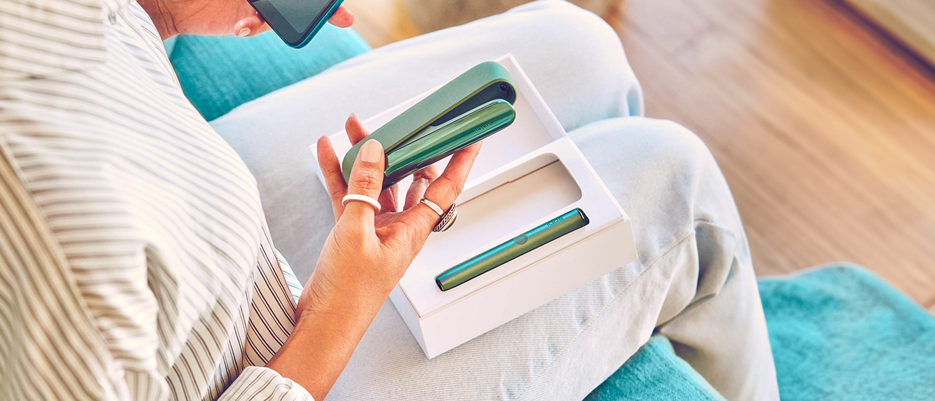 hand showing an IQOS 3 DUO holder