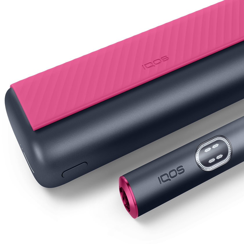 IQOS ILUMA PRIME color gris con tapa rosa, mostrando opciones de personalización, acompañado de texto “Personaliza tu dispositivo”.