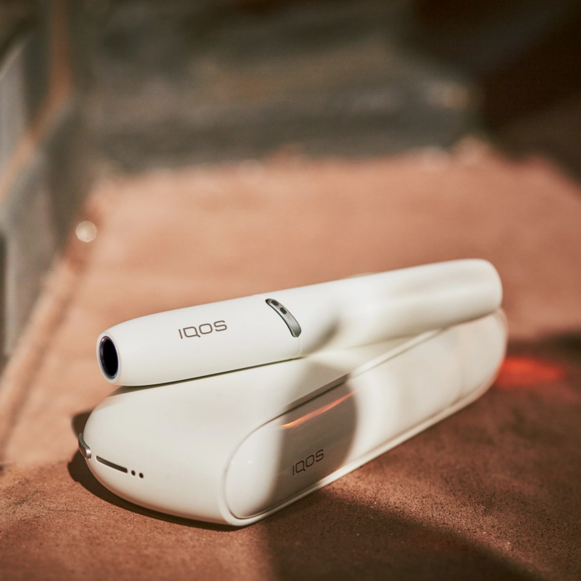 White IQOS device
