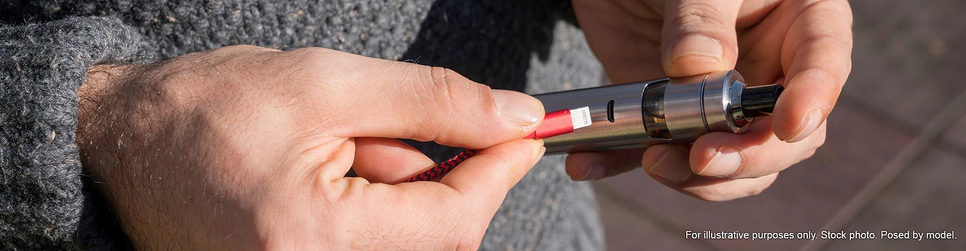 Man charging e-cig