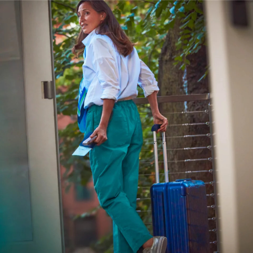  Woman with luggage bag