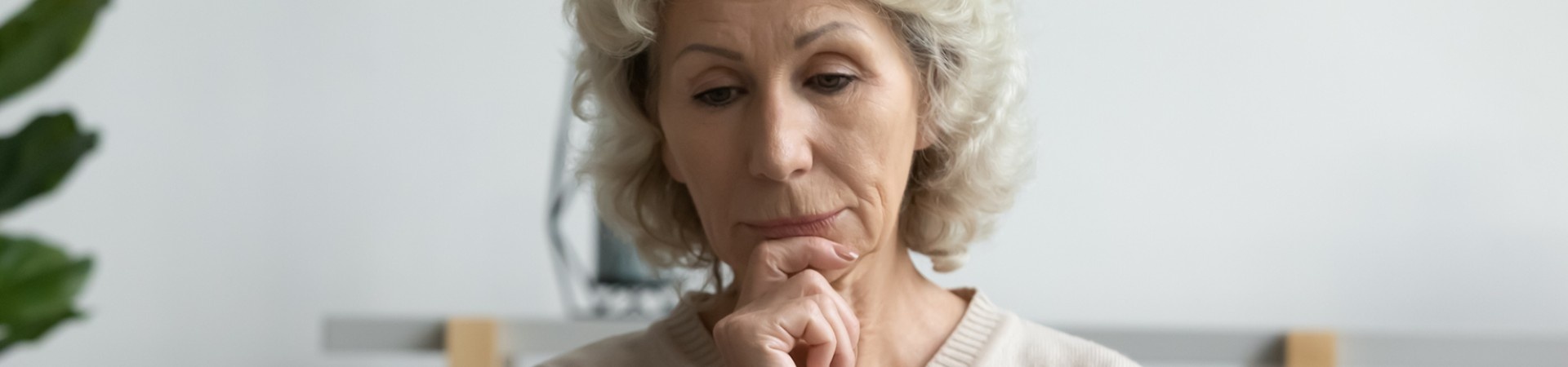 Older woman looking at laptop