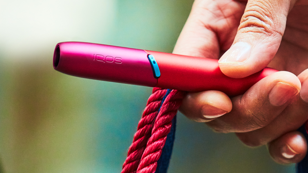 Red colored IQOS 3 device