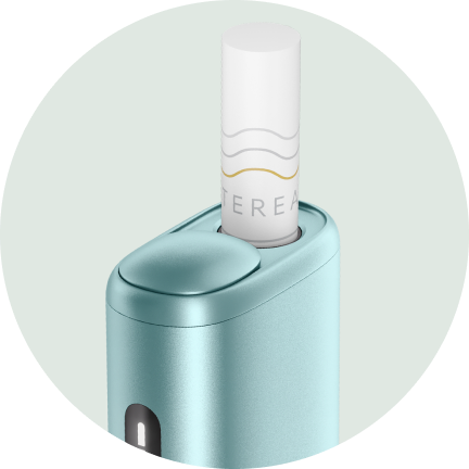 IQOS ILUMA i ONE Device with inserted tobacco stick