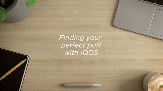 Office desktop with text in the center - Finding your perfect puff with IQOS