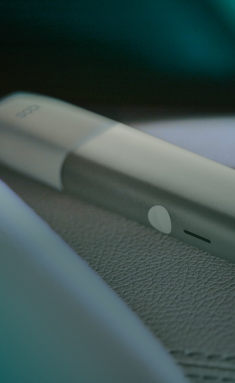 IQOS ILUMA ONE device with a TEREA stick.
