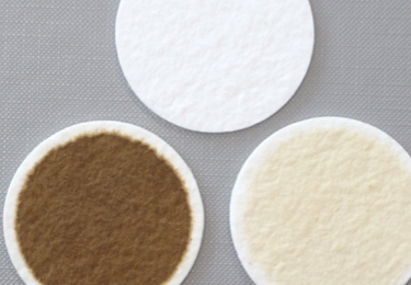Representation of three filters, one pristine and the two others contaminated