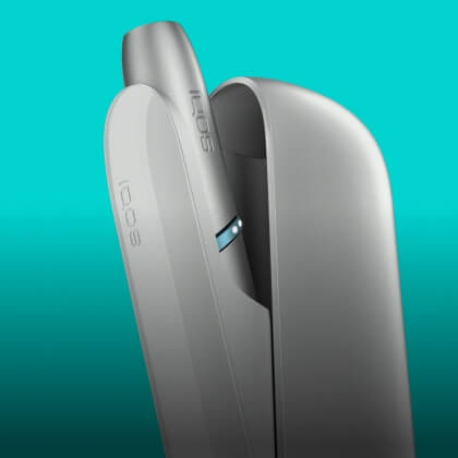 Silver IQOS Originals Duo heated tobacco holder and pocket charger. Silver IQOS Originals Duo heated tobacco holder and pocket charger.